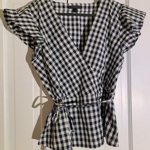 Black and white checked blouse
